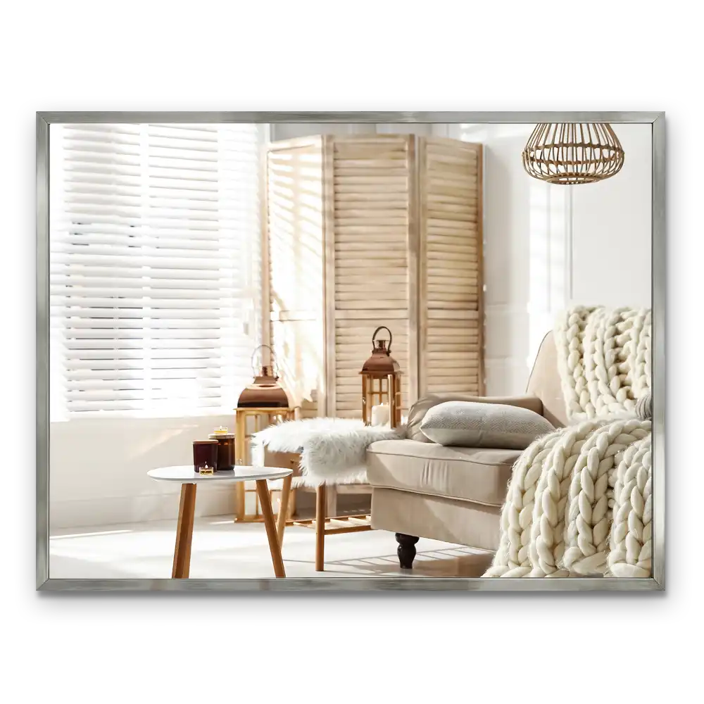 Rectangular wall mounted mirror with a silver frame