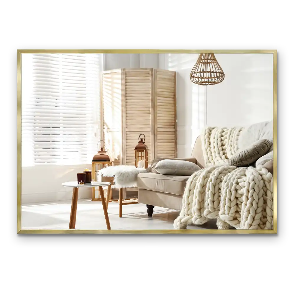 Rectangular hanging mirror with a gold frame