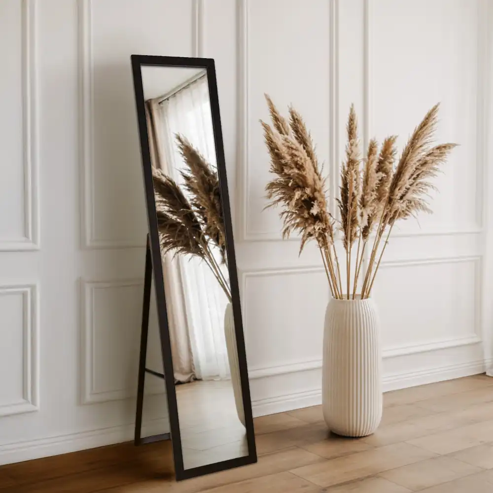 Standing mirror in a black frame