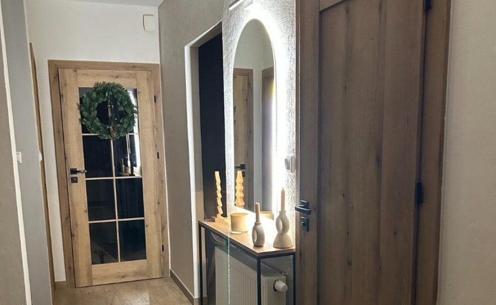 mirror above the chest of drawers